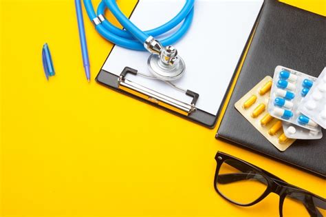 Premium Photo Stethoscope Clipboard And Pills Closeup Medical