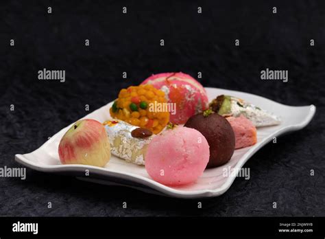 Variety Of Assorted Desi Ghee Indian Mithai Viz Laddu Kesar Barfi