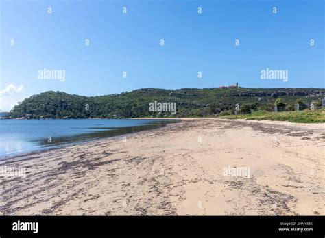 Barrenjoey Lighthouse On The Headland At Palm Beach With Station Beach