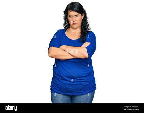 Plus Size Brunette Woman Wearing Casual Clothes Skeptic And Nervous