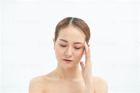 Emotional Portrait Of A Tired And Tensed Young Naked Beautiful Woman Over White Background