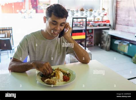 Man Eating Curry Hi Res Stock Photography And Images Alamy