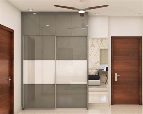 door sliding wardrobe design  loft storage livspace