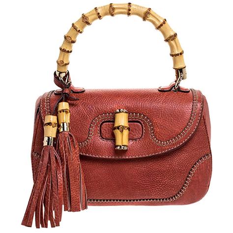 Gucci Rust Leather Medium Tassel New Bamboo Top Handle Bag At 1stdibs