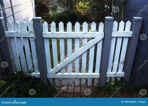 Wooden Picket Fence Gate in White and Grey Stock Photo - Image of grey, driveway: 104144962