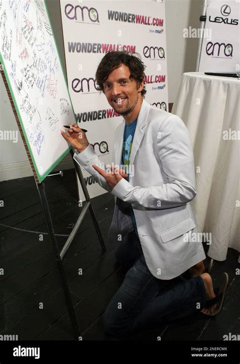 Singer Jason Mraz Signs The Poster At The 20th