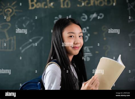 Happy Beautiful Asian Schoolgirl Girl Standing Holding Books Standing