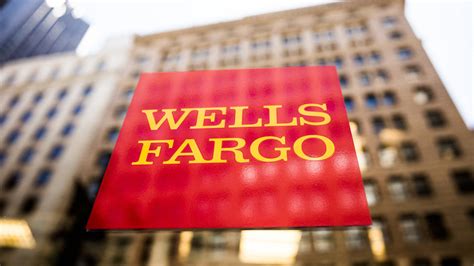 Download Wells Fargo Logo Overlaid On Building Wallpaper