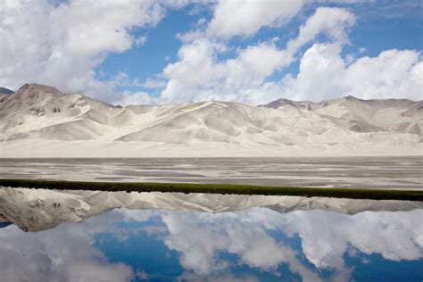 Karakul Lake - pure jewel among the harsh landscape of the surrounding ...