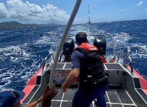 Coast Guard Comes To Rescue Of Two Boaters Tows Disabled Vessel To