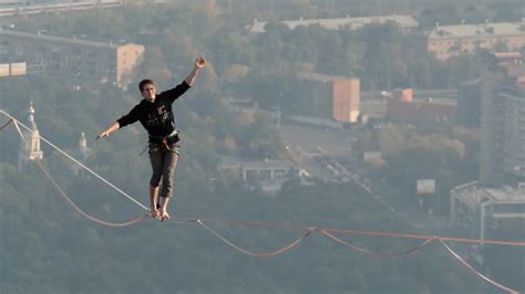 A Man Balances On Tight Rope Stock Video Motion Array