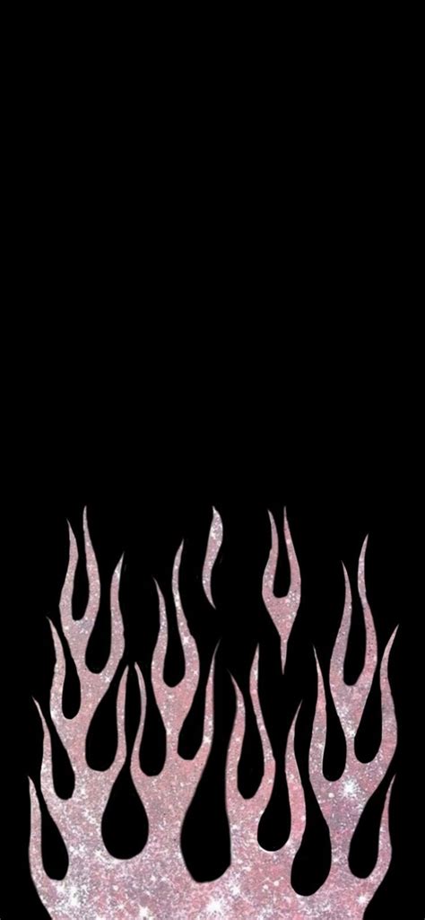 A Black Background With Pink And White Flames