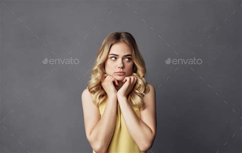 Cheerful Pretty Blonde Yellow Dress Emotions Hands Near Face Cropped View Gray Background Stock