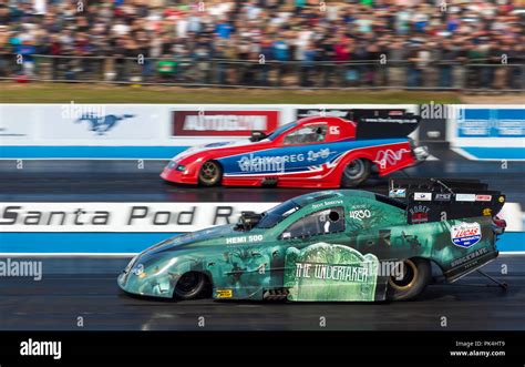 Top Fuel Funny Car drag racing at Santa Pod raceway. Steve Ashdown ...