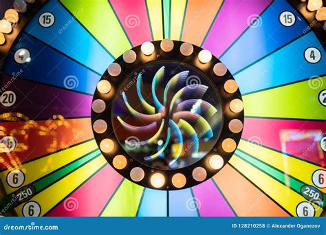 Bonus Spinning Wheel on Top of Gambling Machine Stock Photo - Image of ...