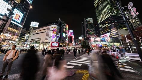 Time Lapse Of Car Traffic Transportation Crowd People Walk At Shibuya