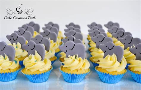 A Herd Of Mini Elephant Cupcakes Elephant Cupcakes Cake Creations