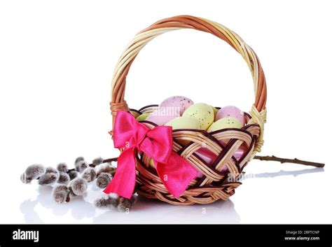 Basket With Easter Eggs And Pussy Willow Twigs Isolated On White Stock