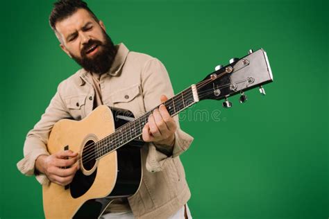 Bearded Man Singing And Playing On Acoustic Guitar Isolated Stock