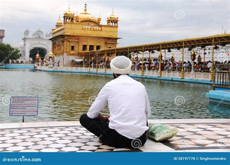 A Sikh Guy Praying In Front Of Golden Temple Editorial Stock Photo