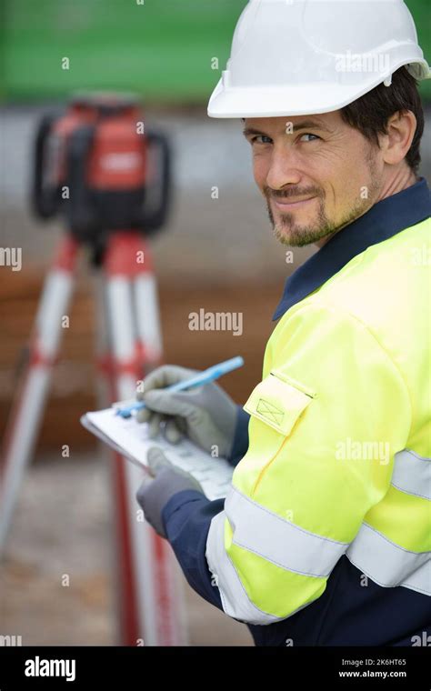 Land Surveyors Measuring With Tacheometer S Stock Photo Alamy