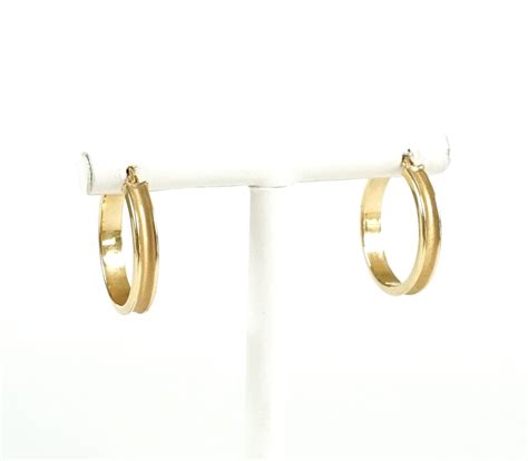 Boucles d oreilles Créoles en or jaune 18K 750 oo le jonc