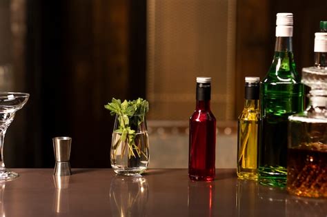 Free Photo Alcohol Bottles Arrangement At Bar