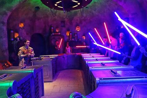 Using The Force To Build A Lightsaber Inside Savi S Workshop At Disney