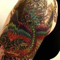 Majestic firebird tattoo on tummy - Tattooimages.biz