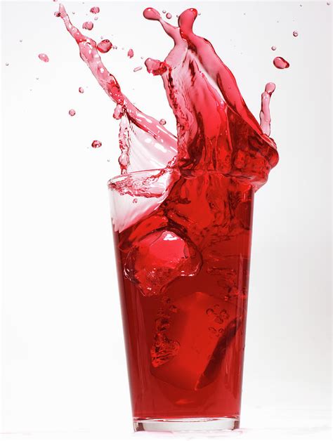 Red Juice Spilling From Glass Photograph By Alex Cao Fine Art America