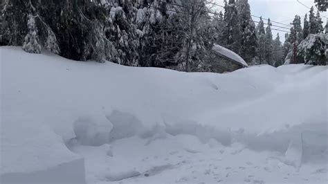 National Guard helps California residents dig out from several feet of snow