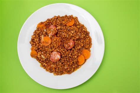 Premium Photo Lentils With Chorizo And Carrot On White Dish Typical