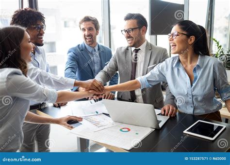 Happy Business People Celebrating Success At Company Stock Image