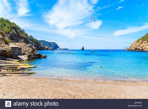 View Of Cala Benirras Beach With Azure Blue Sea Water Ibiza Island