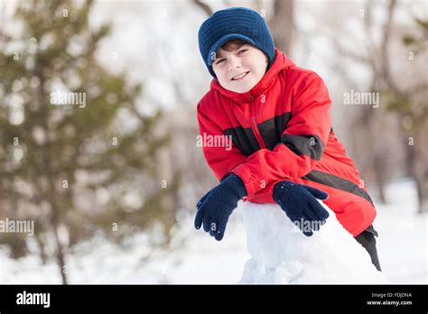 Little Cute Boy Having Fun In Winter Park Stock Photo Alamy