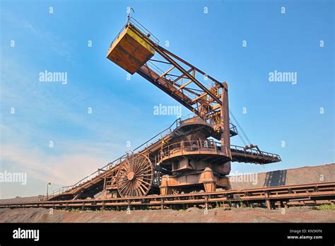 coal loading conveyor belt piles coal inside of plant Stock Photo - Alamy