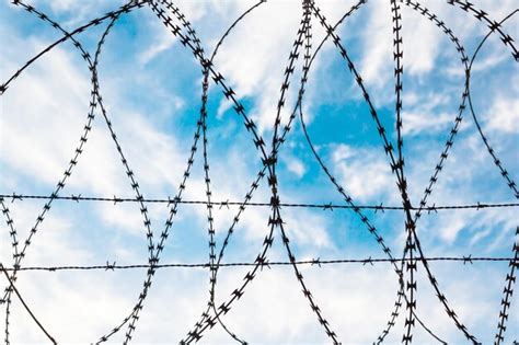 Premium Photo Barbed Wire Against The Sky