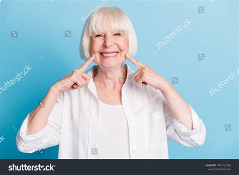 Photo Portrait Granny Blonde Hair Pointing Stock Photo 1860353326
