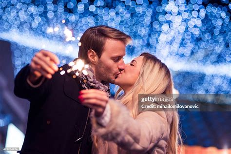 Midnight Kiss High-Res Stock Photo - Getty Images