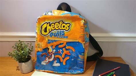 Great, large size backpack, made with recycled Cheetos bags. Adjustable straps, 2 outer pockets ...