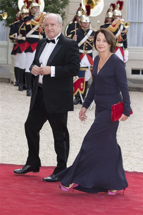 Photo Hubert Védrine et sa femme lors du banquet à l Elysée donné en