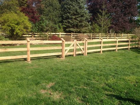 3 Rail Post And Board With Wire And Face Caps On The Front Fence Line