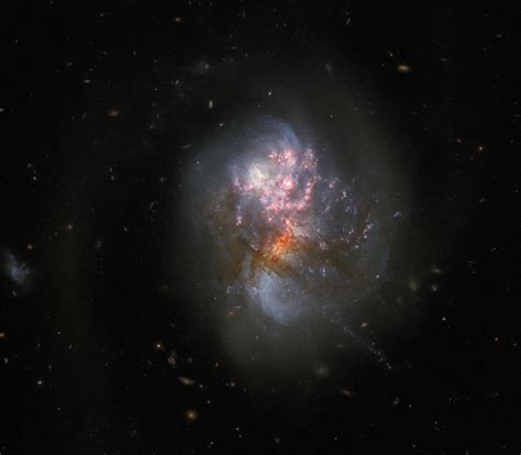 Esa Hubble Explores A Pair Of Merging Galaxies