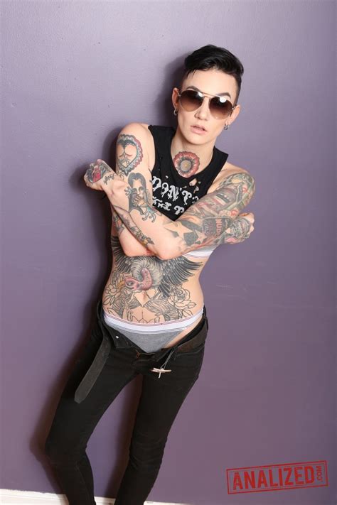 Inked And Hot Babe Nikki Hearts Gets To Strip Down Photos