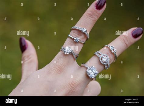 Hand With Many Rings Stock Photo Alamy