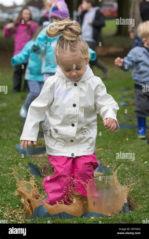 Youngsters Taking Part In The World Puddle Jumping Contest Held At