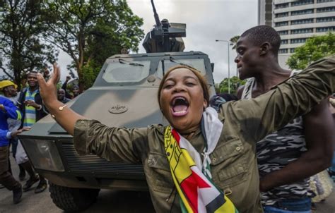 In Pictures Ecstatic Zimbabweans Flood Harares Streets