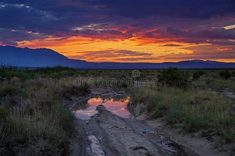 Sunset and Dirt Road stock image. Image of valley, evening - 122469865