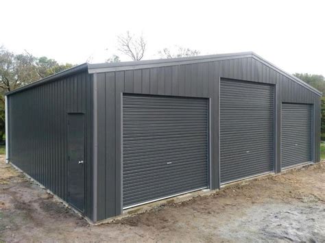 A recently completed shed, finished in #colorbond steel Wallaby with Woodland Grey trim. This ...