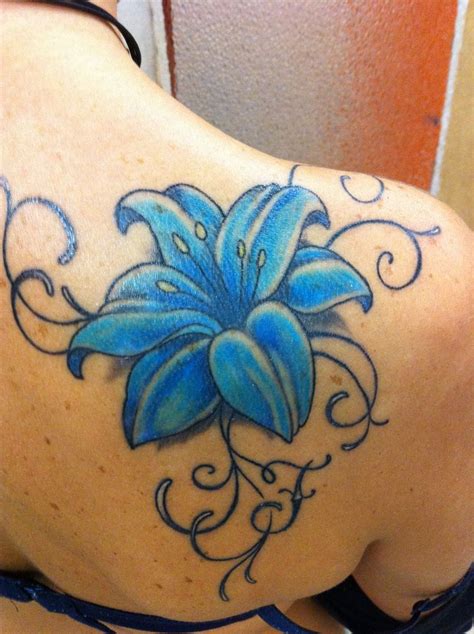 Blue Lily tattoo perfect to cover existing tattoo | Lily tattoo meaning ...